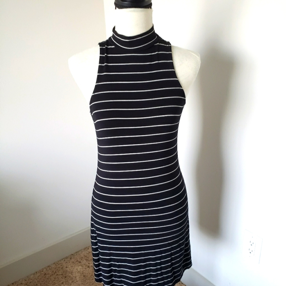 seriously soft. AERO. black striped dress size XS brand new!